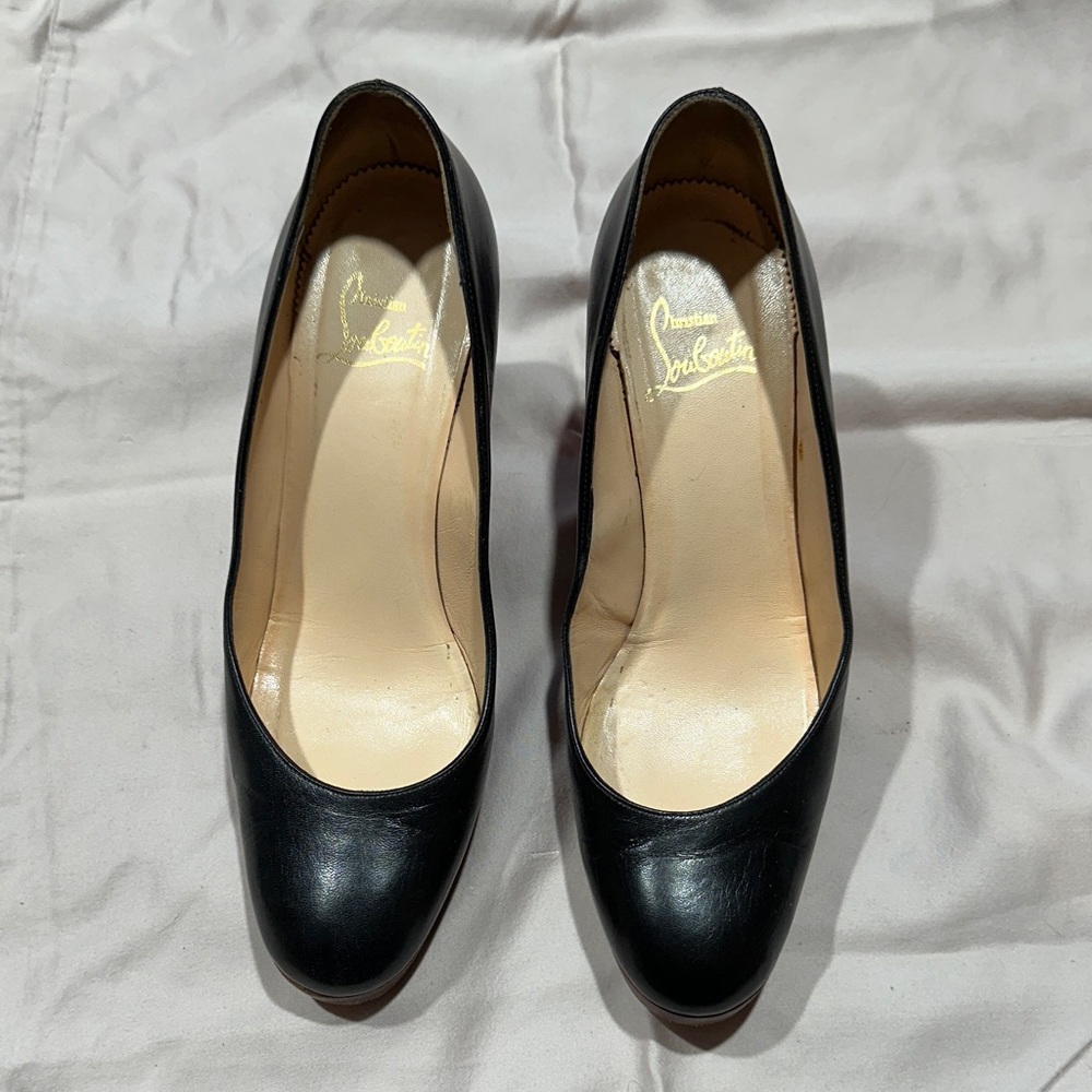 Christian Louboutin black with brown heel